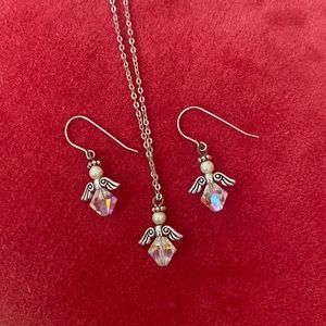 Great gift for a little girl! Set of silver necklace and earrings with angels.